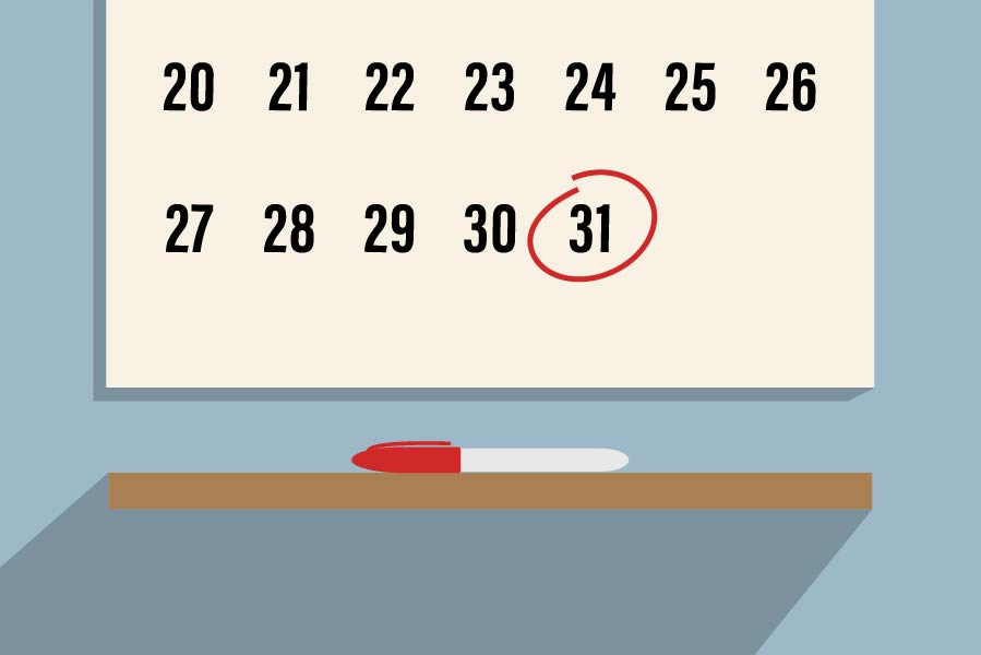Wall calendar with circled date with pen.