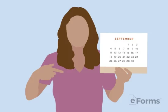 Woman holding and pointing at calendar.