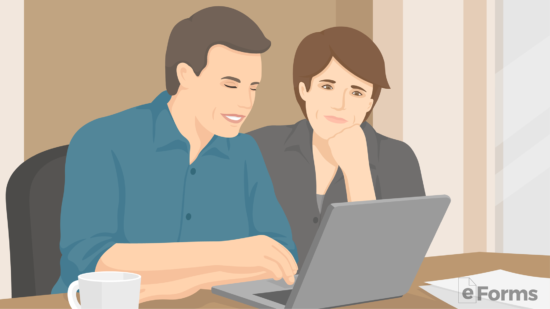 couple reviewing different healthcare agents on laptop