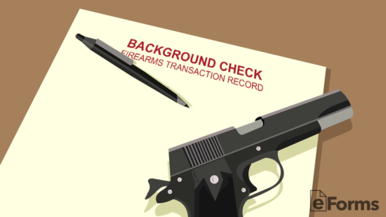 handgun sitting atop document labeled "background check firearms transaction record"