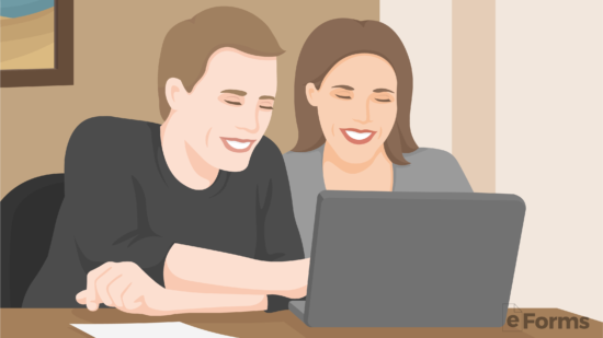 couple reviewing quitclaim deed on laptop