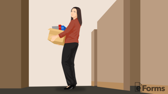 employee standing by doorway with box of belongings