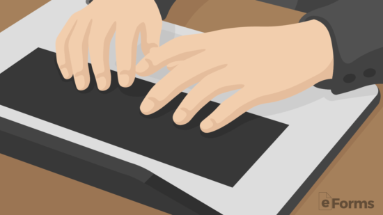 closeup of someone typing on laptop