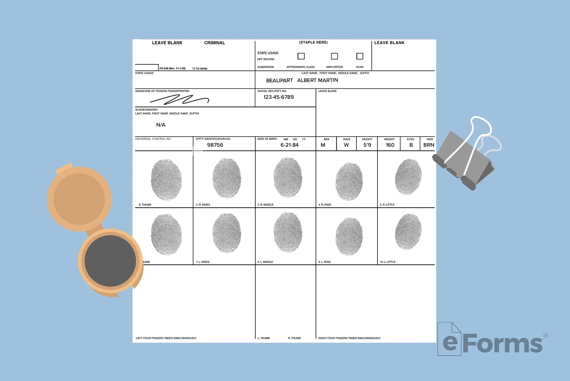FBI fingerprint form with stamp pad and binder clip.