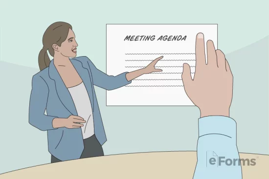 Woman showing wall chart with attendee holding hand up