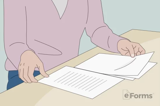 Woman passing out paper documents on table