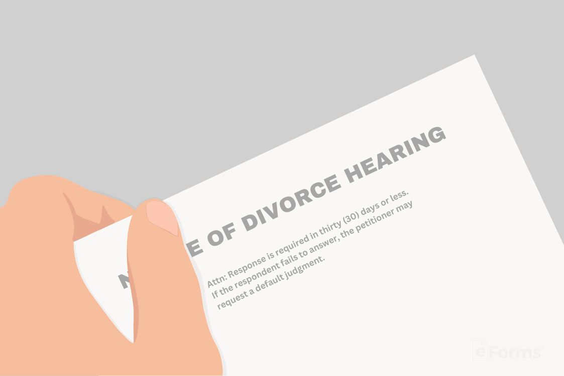 Person holding notice of divorce hearing