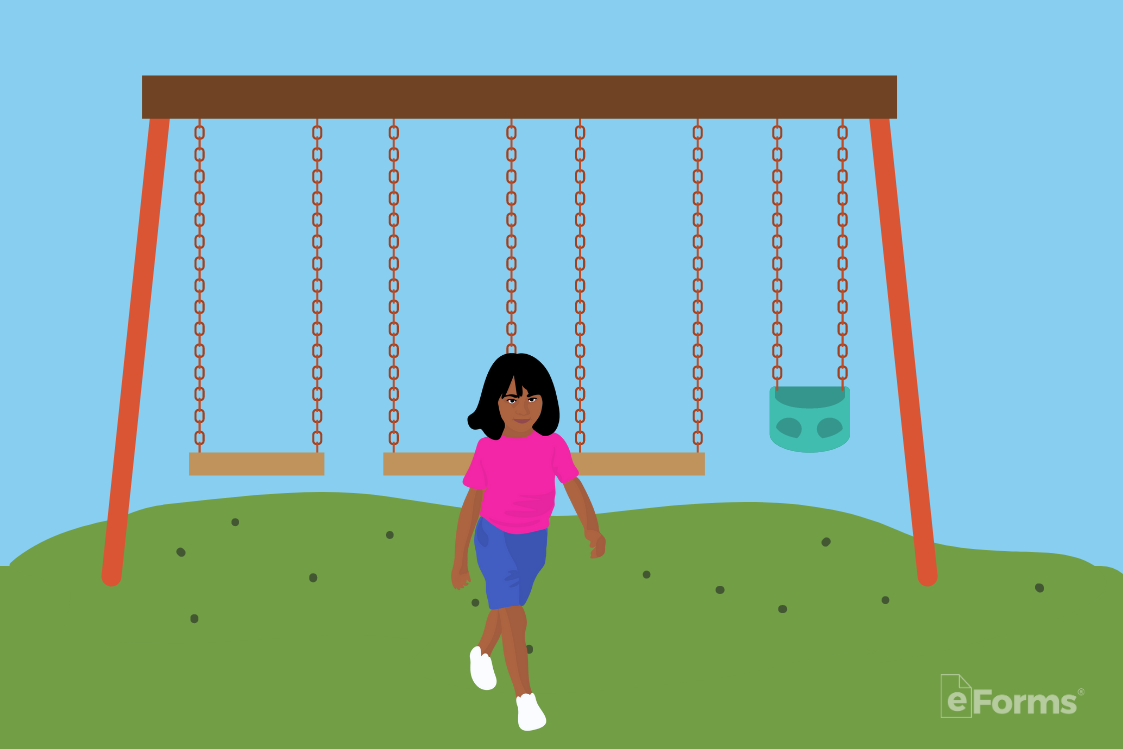 Young child playing on swing set