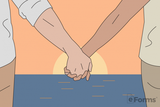 couple holding hands with sunset ocean backdrop