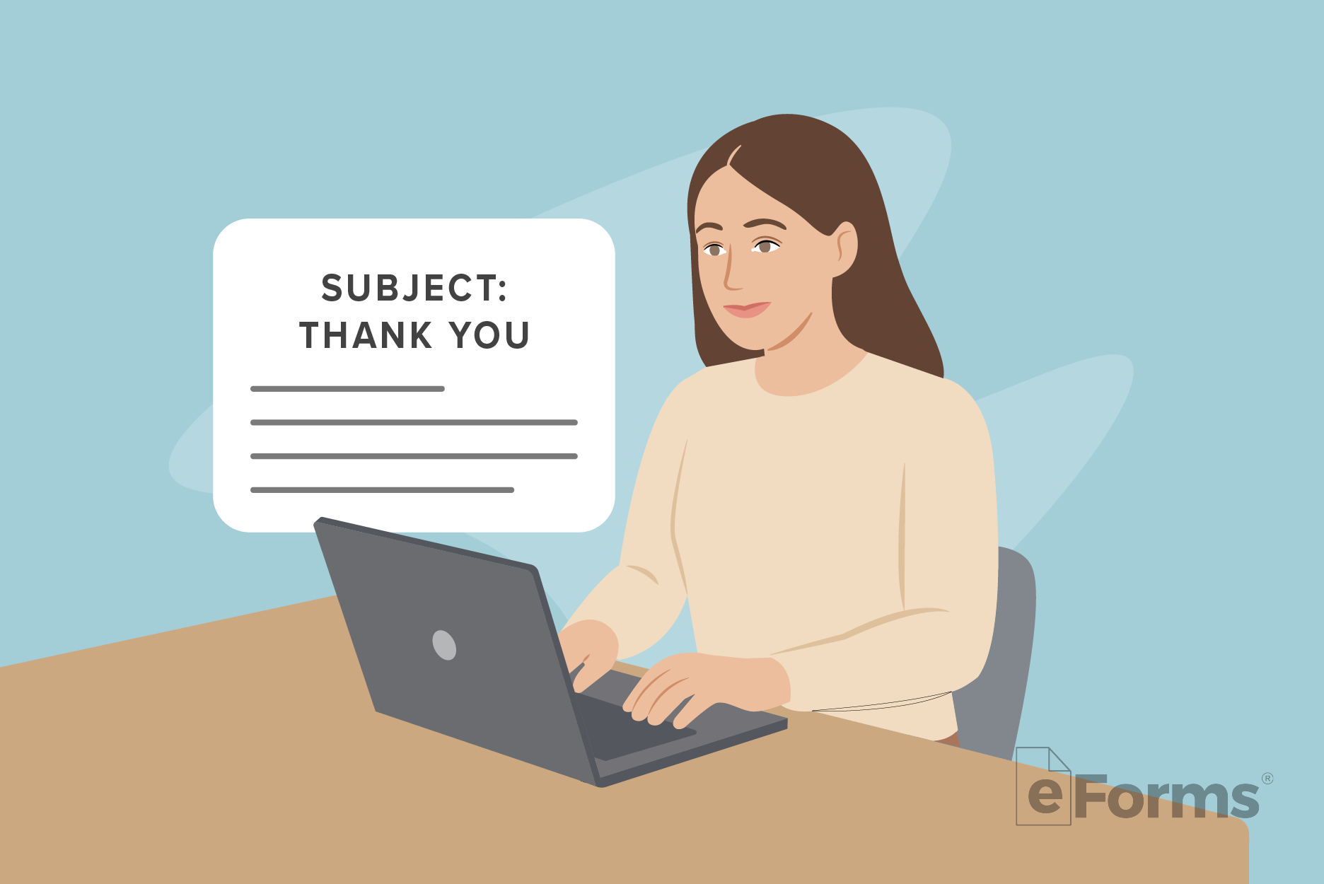 Woman at desk writing a thank you note on her laptop computer.